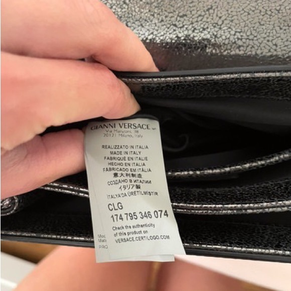 Versace leather silver handbag looks brand new. - Picture 2 of 7